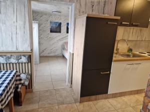 a small kitchen with a sink and a counter at Appartment in Oberndorf bei Schwanenstadt in Schwanenstadt