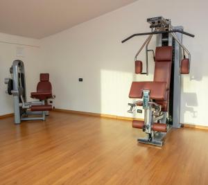 The fitness centre and/or fitness facilities at Hotel Riz B.B