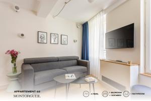 Televízia a/alebo spoločenská miestnosť v ubytovaní Beauquartier - Montorgueil