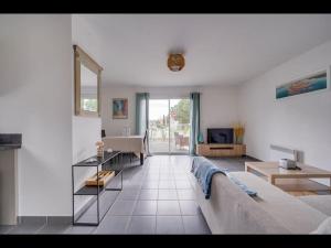 Μια τηλεόραση ή/και κέντρο ψυχαγωγίας στο Maison Caroline Arkea Arena