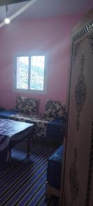 a room with two beds and a window at كتامة ketama in Ketama