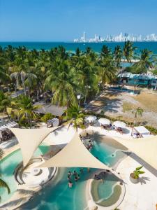 an aerial view of the beach at the excellence punta cana resort at Palmarito Beach Hotel in Tierra Bomba