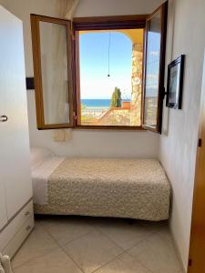 Posteľ alebo postele v izbe v ubytovaní Villa Mare Giuggiola
