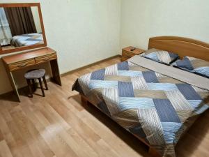 Posteľ alebo postele v izbe v ubytovaní Apartments on Kirova