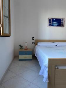 Posteľ alebo postele v izbe v ubytovaní Villa Mare Giuggiola