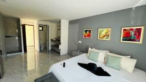 Ліжко або ліжка в номері Residences by MP Cabo San Lucas