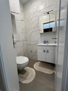 Ett badrum på Apartment Nadaa