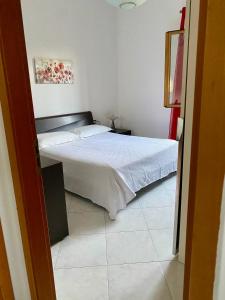 Posteľ alebo postele v izbe v ubytovaní Villa Mare Giuggiola