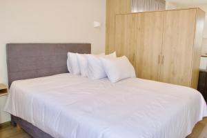 Postel nebo postele na pokoji v ubytování Piraeus Relax
