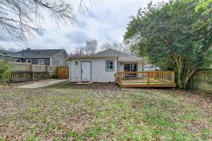 a house with a wooden deck in a yard at Dreamy 3bed/3bath home with Yard in Atlanta