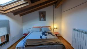 a bedroom with a large bed in a room at B&B Audrey in Varese +104 photos