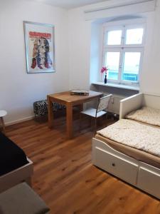 En eller flere senge i et værelse på Alfred Second