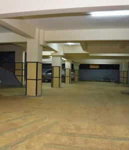 an empty parking garage with cars parked in it at Studios in roysambu in Nairobi