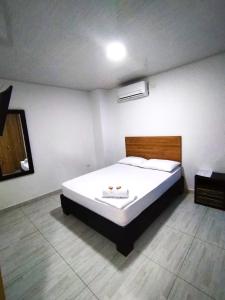 Voodi või voodid majutusasutuse Hotel Real del Valle toas