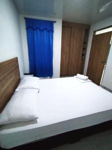 Voodi või voodid majutusasutuse Hotel Real del Valle toas