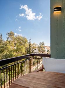 a balcony with a view of the sky at Athenian Serene City Escape in Athens