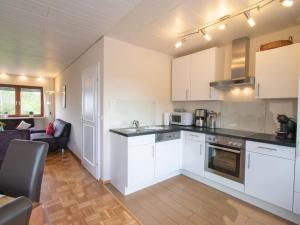A cozinha ou cozinha compacta de Holiday apartment Blasius-Nantke