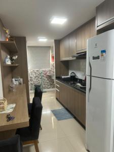 Kuchyň nebo kuchyňský kout v ubytování Apartamento no centro