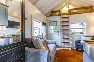 a tiny house with a living room and a kitchen at Pensacola Studio Bungalow Less Than 1 Mi to Bayview Park! in Pensacola +18 photos