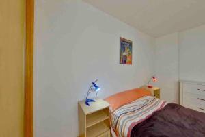 Giường trong phòng chung tại Casa Del Mar