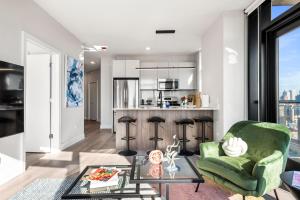 A seating area at Avra Stylish Apartments Prime West Loop Location Near Union Park