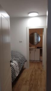 Ένα ή περισσότερα κρεβάτια σε δωμάτιο στο Kasa Or 2