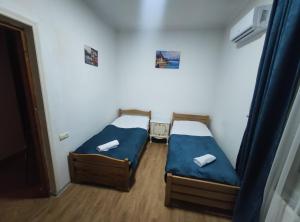 Postel nebo postele na pokoji v ubytování Ortachala Summer House