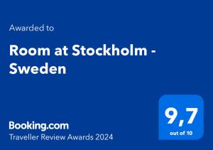 Ett certifikat, pris eller annat dokument som visas upp på Room at Stockholm - Sweden