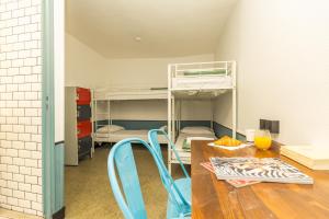 Cama o camas de una habitación en Young and Happy Latin Quarter by Hiphophostels