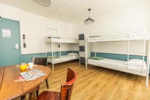 Cama o camas de una habitación en Young and Happy Latin Quarter by Hiphophostels