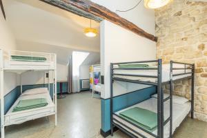 Cama o camas de una habitación en Young and Happy Latin Quarter by Hiphophostels