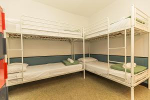 Cama o camas de una habitación en Young and Happy Latin Quarter by Hiphophostels