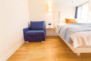 Ένα ή περισσότερα κρεβάτια σε δωμάτιο στο LUXSOR ORBl CITY