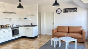 Schönes Erwachen im Frankfurter Penthouse 주방 또는 간이 주방