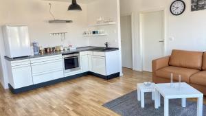 Schönes Erwachen im Frankfurter Penthouse 주방 또는 간이 주방