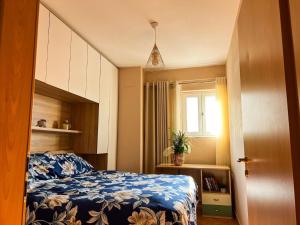 Postel nebo postele na pokoji v ubytování SkyView Oasis Premium Apartment