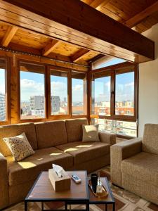 Posezení v ubytování SkyView Oasis Premium Apartment