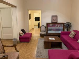 A seating area at Prime location 2 bed rooms Apartment , near the Nile & Cairo Center