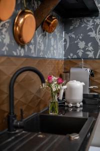 Kuchyň nebo kuchyňský kout v ubytování De Loods