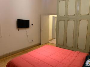 A television and/or entertainment centre at Prime location 2 bed rooms Apartment , near the Nile & Cairo Center