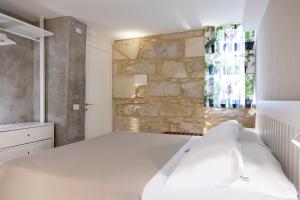 Postel nebo postele na pokoji v ubytování Le Sirene B&B + 17 fotografií