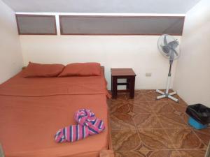 Katil atau katil-katil dalam bilik di Nambí Rooms