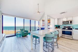 a kitchen with a view of the ocean at Sea Colony---902 Annapolis House in Bethany Beach