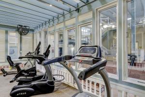 a gym with two exercise bikes and a treadmill at Hilton Head Resort 4336 in Hilton Head Island