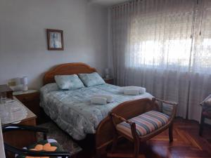 Postel nebo postele na pokoji v ubytování Casa Jesús