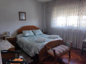 A bed or beds in a room at Casa Jesús