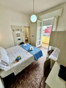 Postel nebo postele na pokoji v ubytování Hotel Napoleon