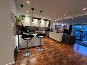 Kuchyň nebo kuchyňský kout v ubytování Luxurios Home