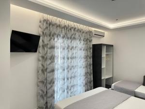 Voodi või voodid majutusasutuse Ionian View B&B toas