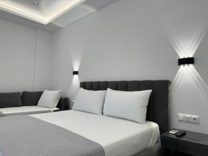 Voodi või voodid majutusasutuse Ionian View B&B toas
